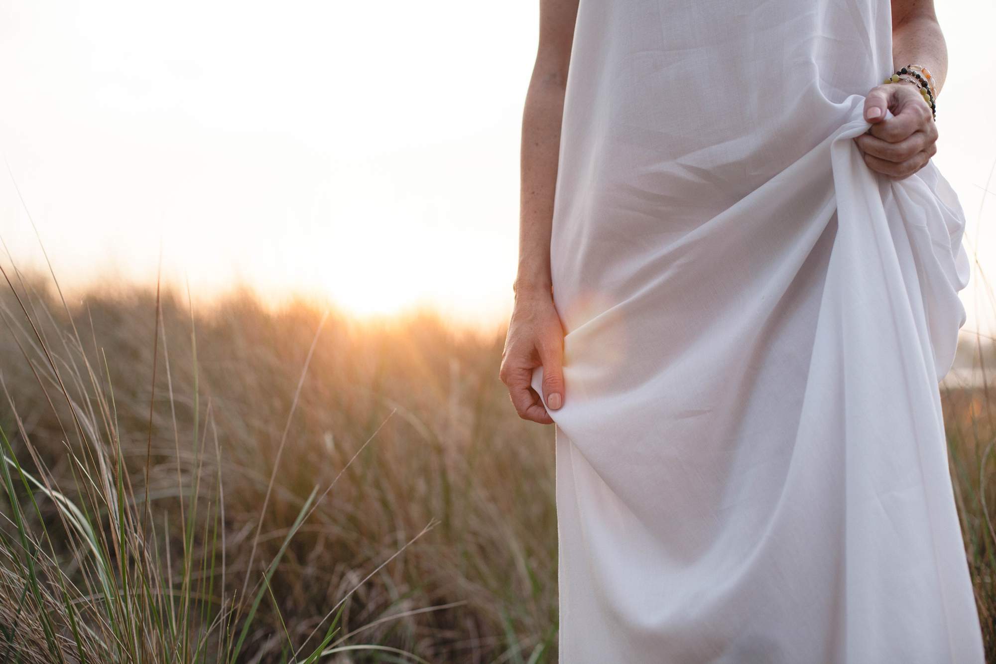 Sunset boudoir photography for undone sessions.